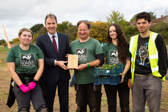 The Grow Wilder nursery team being presented with their Bee Bold Award by Metro Mayor Dan Norris