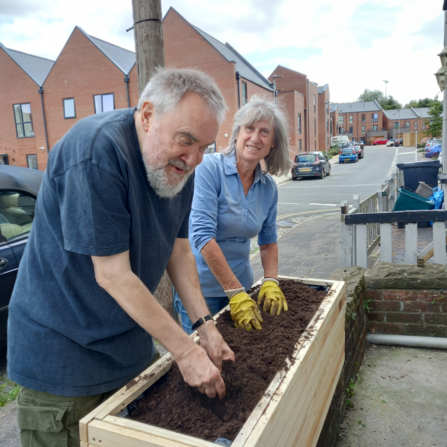 Camerton Road Wild Roads residents making a planter