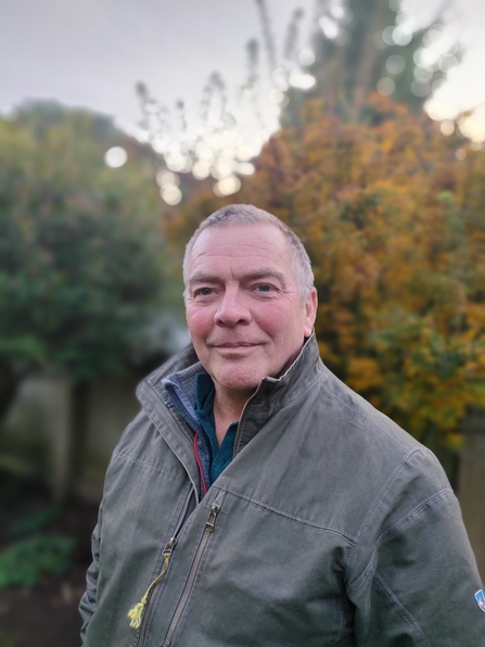 Image of Nigel Wilson, Interim CEO of Avon Wildlife Trust, with trees in background, Interim CEO