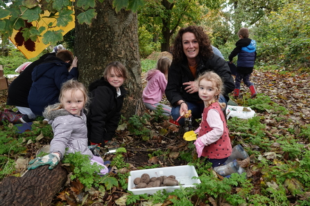 Family planting bulbs